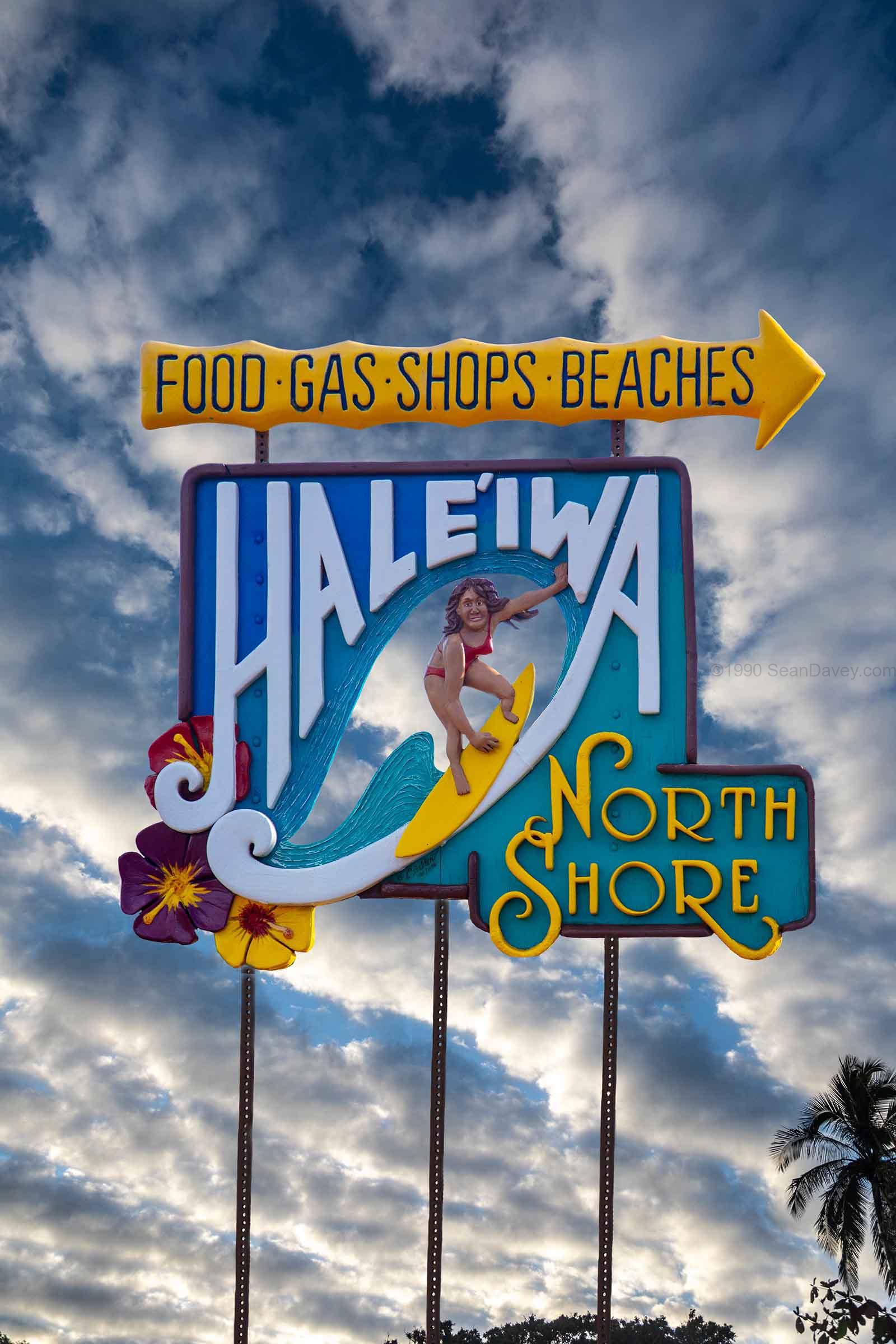 Haleiwa Sign Woman Clouds