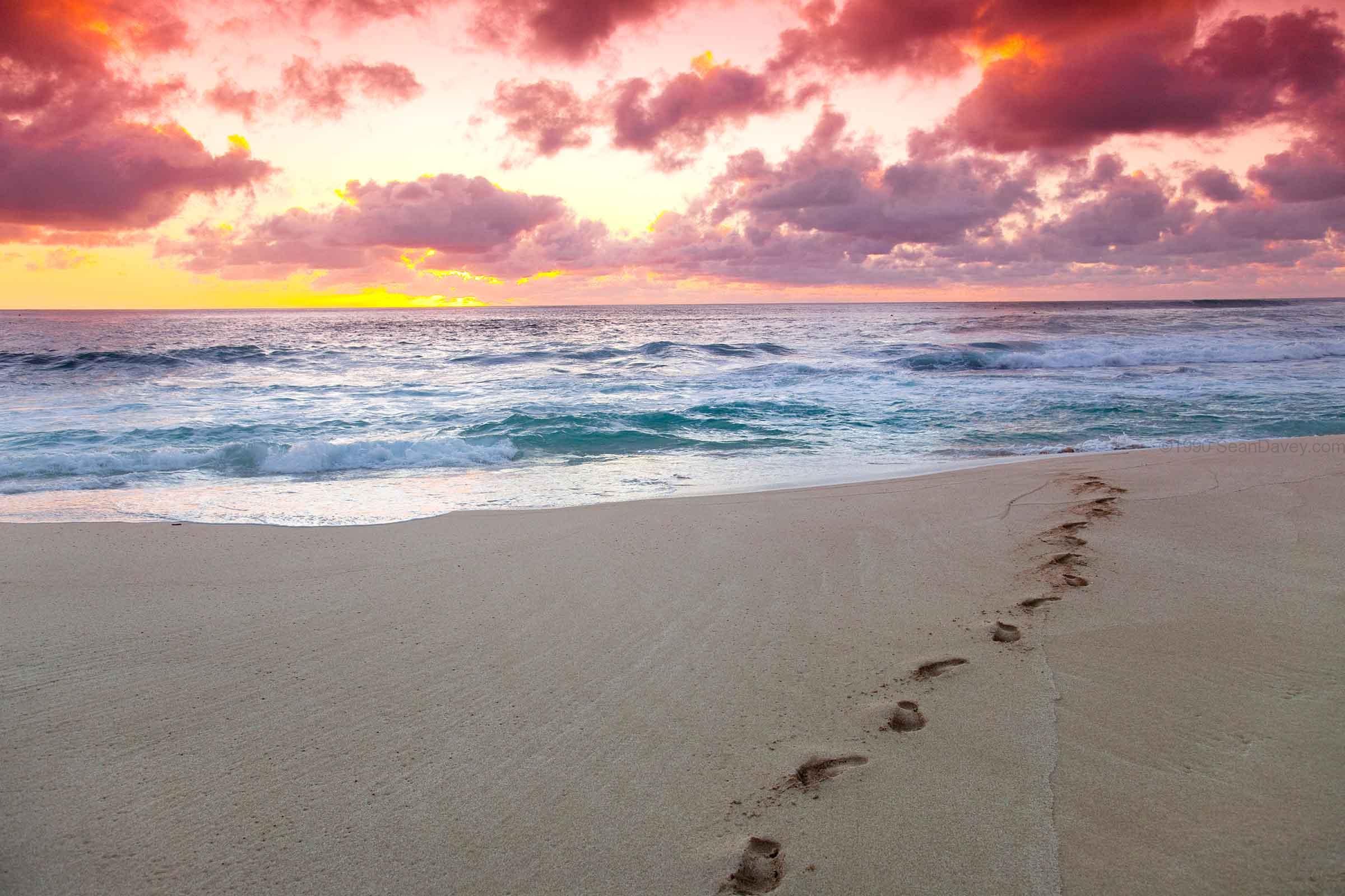 Footprints On The Beach Sunset Footprints In Sand On Beach At Sunrise